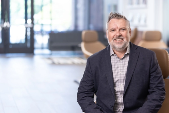 portrait of a smiling person in business attire